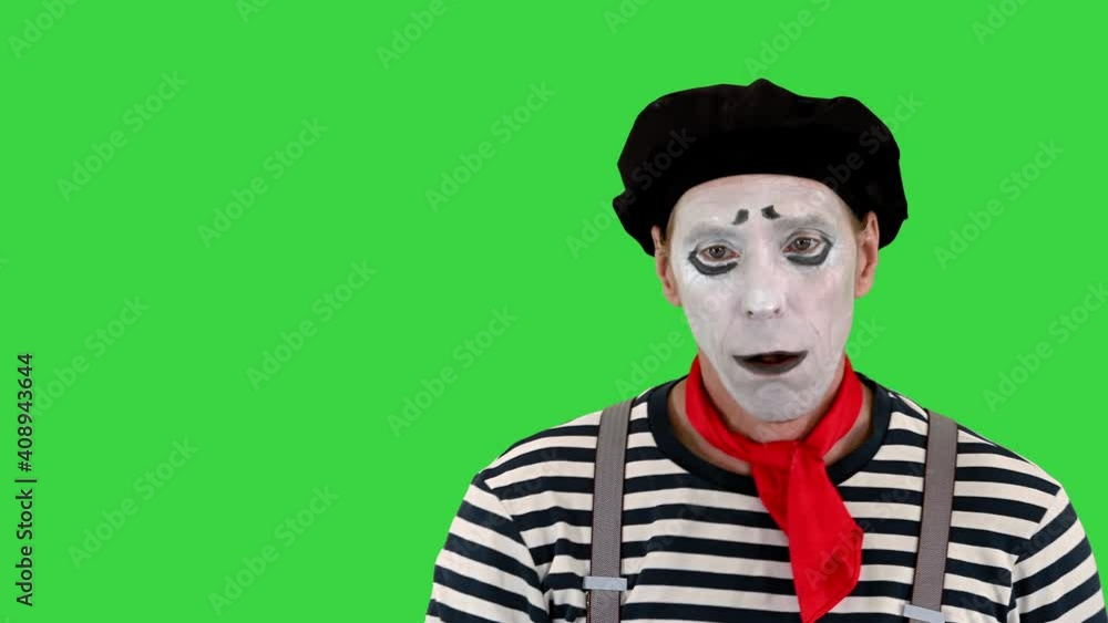 Mime pretending to be drunk in a bar on a Green Screen, Chroma Key. Mime pretending to be drunk in a bar on a Green Screen, Chroma Key.