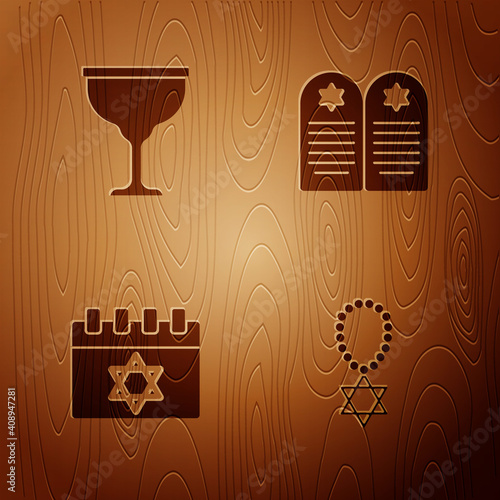 Set Star of David necklace on chain, Jewish goblet, calendar and Tombstone with star david on wooden background. Vector.