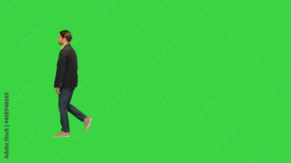 Handsome business man walking by on a Green Screen, Chroma Key. Handsome business man walking by on a Green Screen, Chroma Key.