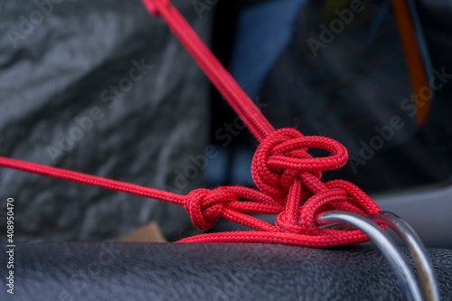 Knot red rope on the truck.