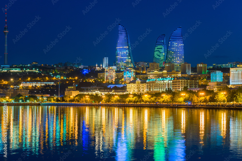 Baku, Azerbaijan - June 23, 2018: Colorful lights on Flame towers, symbol of baku at night.