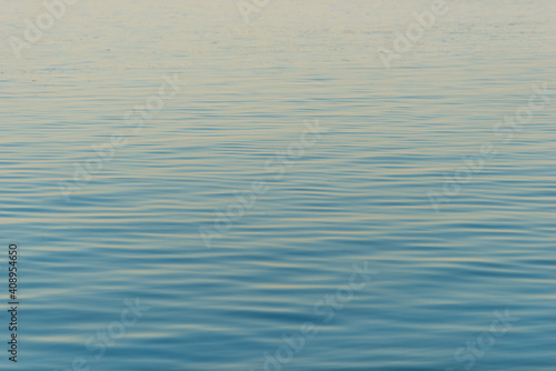 Sea blue water surface texture background, aerial view