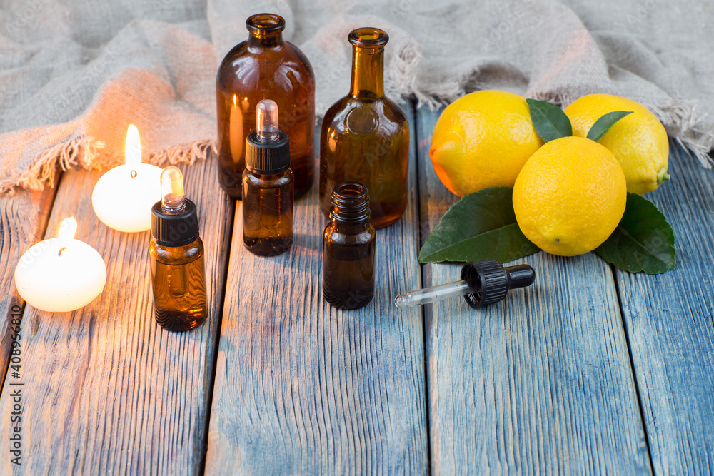 oil pump dispenser bottles, candles and lemons - aromatherapy oil pump dispenser bottles, candles and lemons - aromatherapy