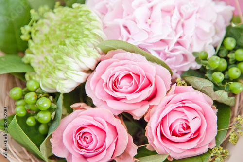 A bouquet of flowers from roses and hydrangeas.
