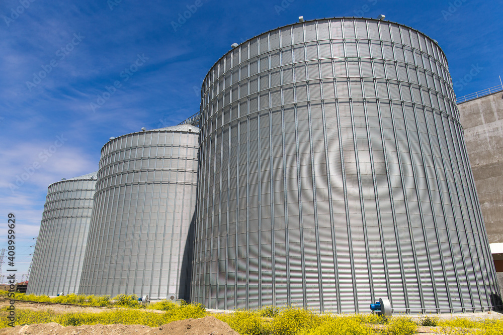 Modern mill outside, metallic cylinder Modern mill outside, metallic cylinder
