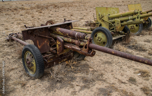 Old armoured vehicles military escorts, guns and tanks in Gardez in Afghanistan photo