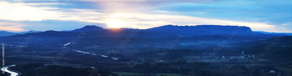 Panorama of dawn on blue mountains in Provence, France