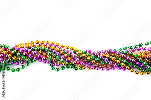 Three colour Merdi gras beads isolated on white background