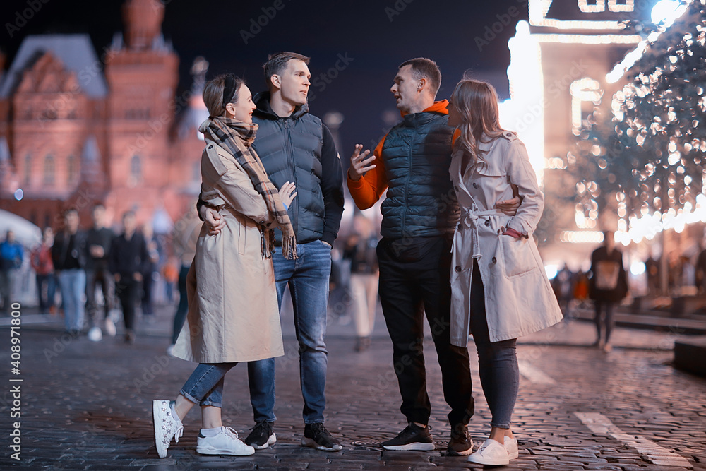 red square evening winter, a group of friends for a walk new year christmas moscow russia red square evening winter, a group of friends for a walk new year christmas moscow russia