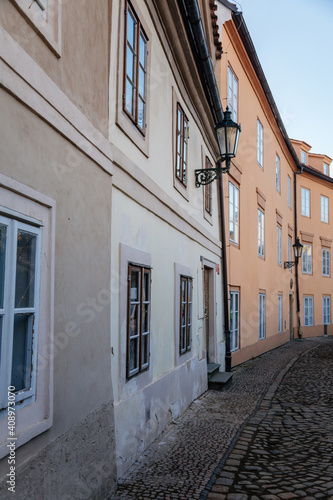 Fascinating narrow picturesque street with baroque and renaissance historical buildings in sunny day, Novy svet, New World in the vicinity of Hradcany, Prague, Czech Republic © AnnaRudnitskaya