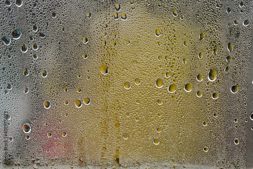 condensation in the form of drops on glass