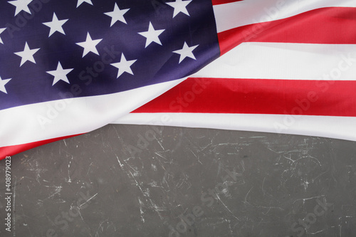 USA flag on a dark concrete background, place for your text.