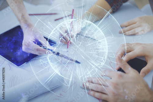 Double exposure of business theme drawing and man and woman working together holding and using a mobile device.