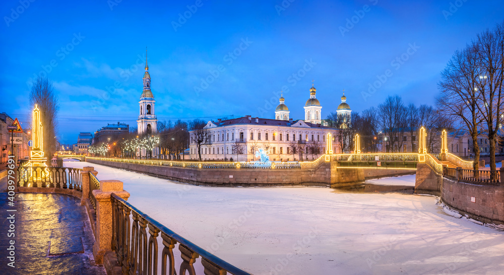 Obraz premium Nikolsky Naval Cathedral and Krasnogvardeisky Bridge in St. Petersburg