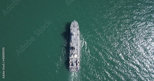 Aerial view of naval ship, battle ship, warship, Military ship resilient and armed with weapon systems, though armament on troop transports. support navy ship. Military sea transport. photo