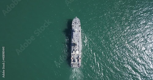Aerial view of naval ship, battle ship, warship, Military ship resilient and armed with weapon systems, though armament on troop transports. support navy ship. Military sea transport.
