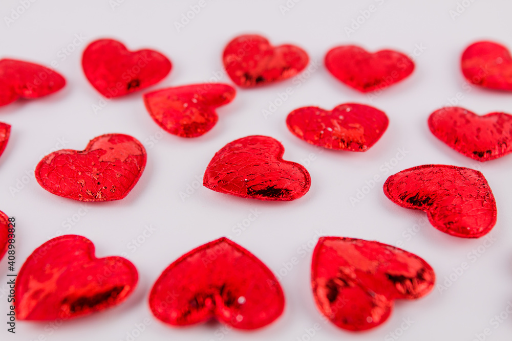 background of red hearts on a white background for the feast of lovers Valentine's day February 14 background of red hearts on a white background for the feast of lovers Valentine's day February 14