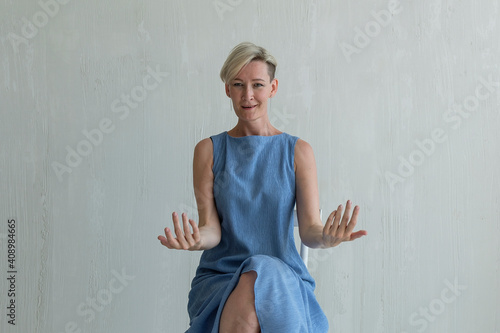 mid adult woman posing emotion in studio photo