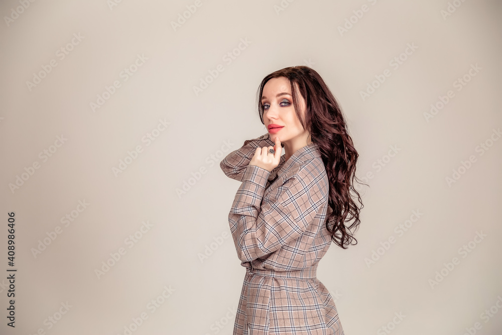 portrait of a beautiful young brunette with long hair. businesswoman portrait of a beautiful young brunette with long hair. businesswoman