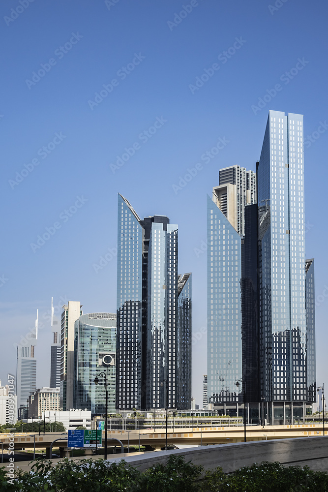 Dubai Modern architecture. Dubai is most populous city and emirate in UAE, and second largest emirate by territorial size after capital - Abu Dhabi. Dubai, United Arab Emirates. Dubai Modern architecture. Dubai is most populous city and emirate in UAE, and second largest emirate by territorial size after capital - Abu Dhabi. Dubai, United Arab Emirates.