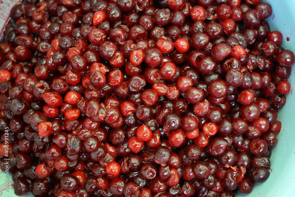 Background of fresh ripe pitted cherries
Background of fresh ripe pitted cherries