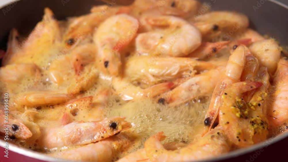big raw tiger prawns roasted with lemon. close up selective focus big raw tiger prawns roasted with lemon. close up selective focus