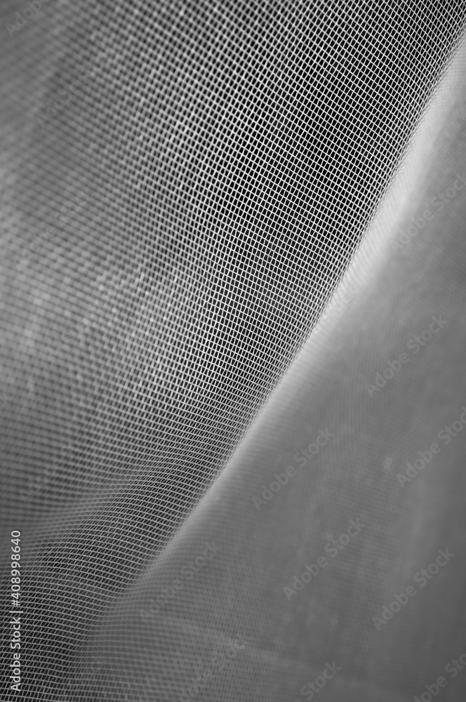 Metal mesh texture on a black background Metal mesh texture on a black background