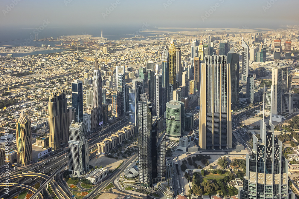 Aerial view of Dubai from Burj Khalifa - tallest skyscraper in the world. DUBAI, United Arab Emirates. 