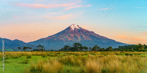 sunset at cone volcano mount taranaki, new zealand