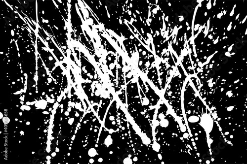 Abstract vector grunge illustration. White splashes of paint on a black background. Random stains, drops, spots, ink prints. Messy handcrafted texture banner. Messy dynamic brush strokes. Copy space