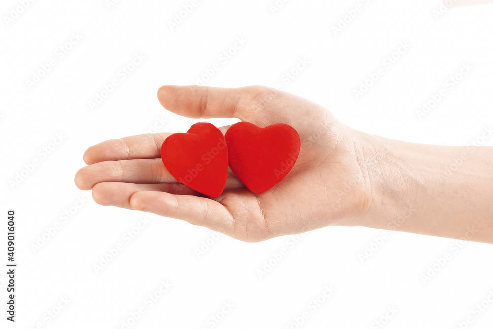 close up.paper red heart on the female hand.photo with copy spac close up.paper red heart on the female hand.photo with copy spac