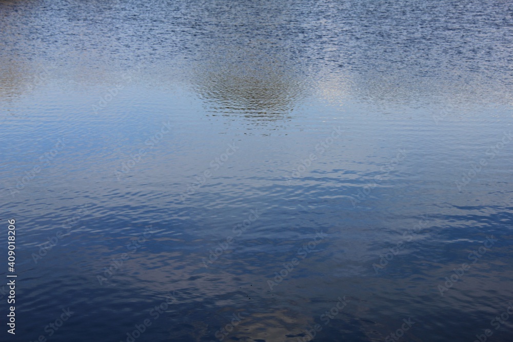 Reflection of the blue sky in the water. Reflection of the blue sky in the water.