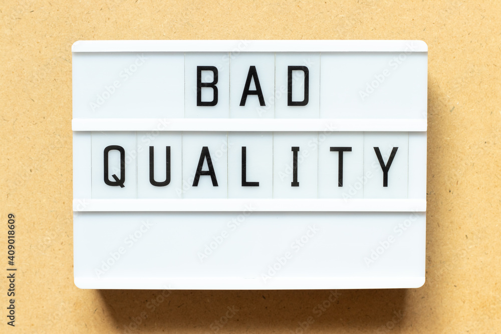 Lightbox with word bad quality on wood background Lightbox with word bad quality on wood background