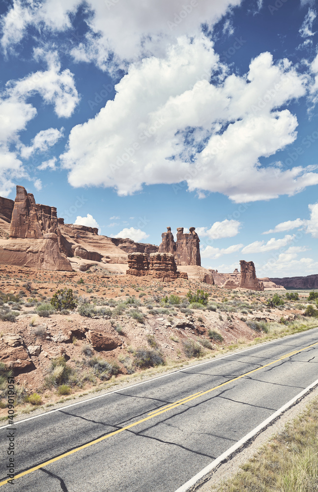 Scenic drive in Arches National Park, color toning applied, Utah, US.