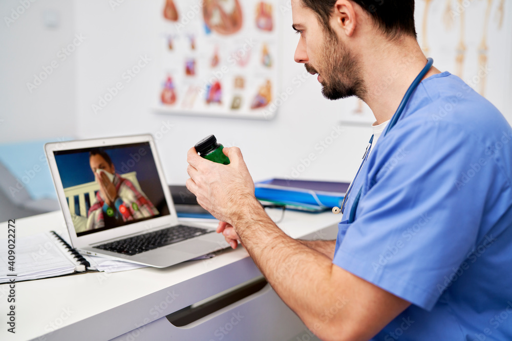 Sick patient on a video call with a doctor Sick patient on a video call with a doctor