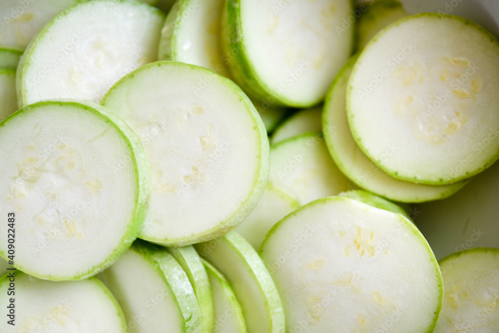 Zucchini. Fresh vegetable cut into rings.
Zucchini. Fresh vegetable cut into rings.