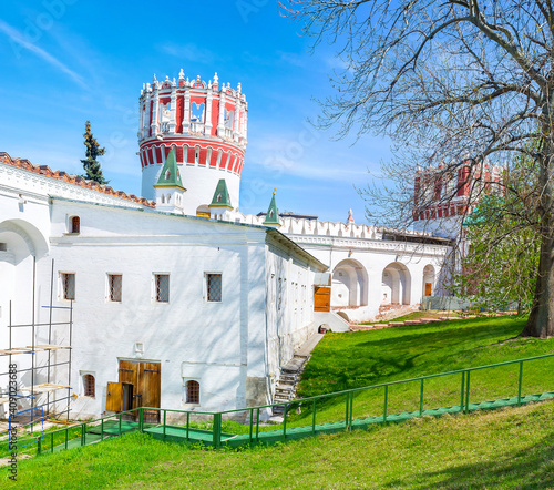 Walking along walls of Novodevichy Convent in Moscow, Russia photo