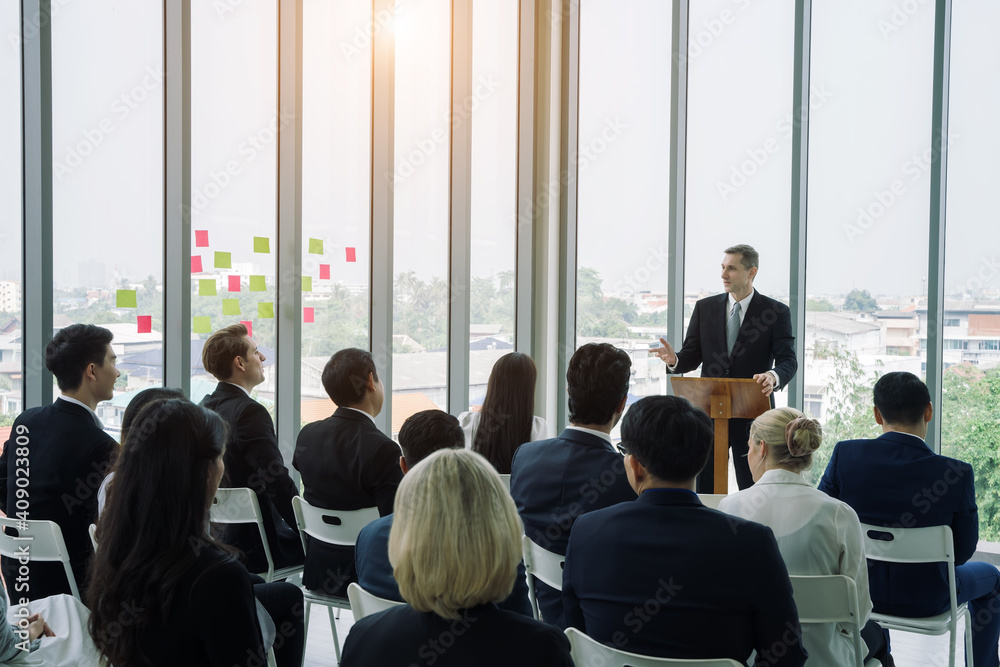 Successful business professionals presenting analytical report and discussing something while meeting in the office. Successful business professionals presenting analytical report and discussing something while meeting in the office.