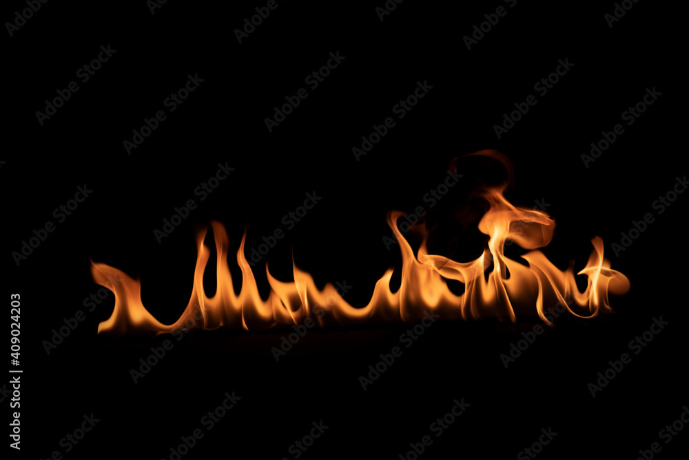 Abstract blaze fire flame texture for banner background.Texture of fire flames on a black background. Real fiery bonfire for creative design elements Abstract blaze fire flame texture for banner background.Texture of fire flames on a black background. Real fiery bonfire for creative design elements