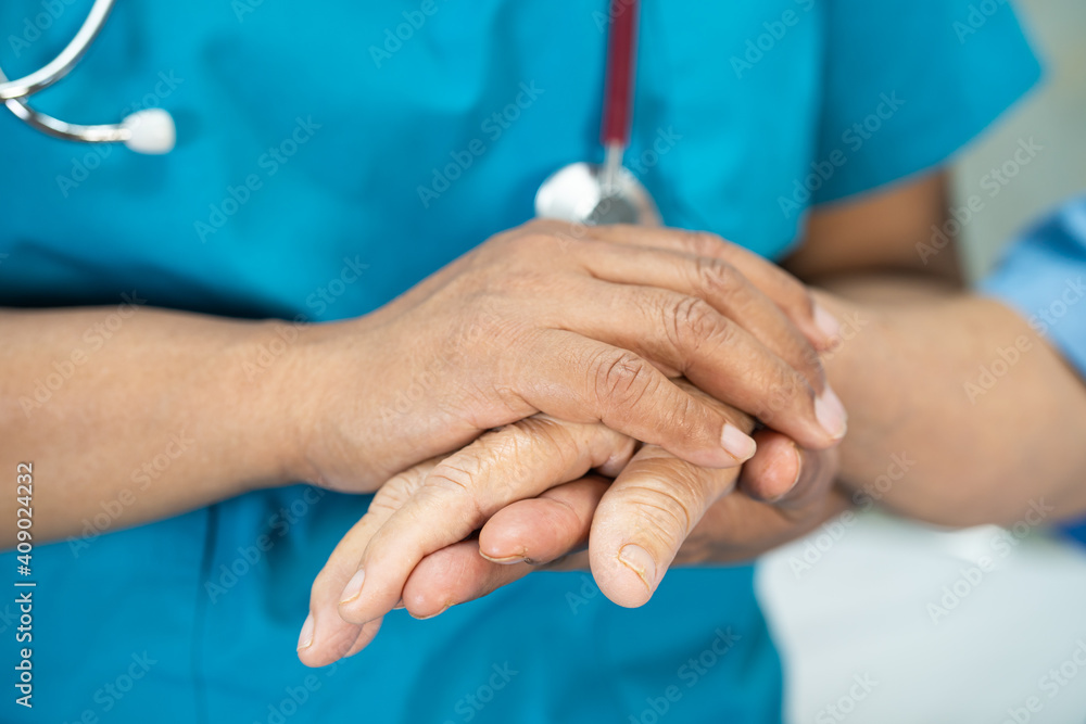 Doctor holding touching hands Asian senior or elderly old lady woman patient with love, care, helping, encourage and empathy at nursing hospital ward, healthy strong medical concept Doctor holding touching hands Asian senior or elderly old lady woman patient with love, care, helping, encourage and empathy at nursing hospital ward, healthy strong medical concept