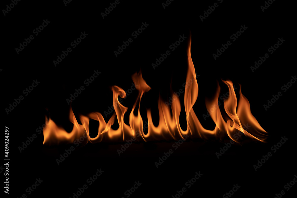 Abstract blaze fire flame texture for banner background.Texture of fire flames on a black background. Real fiery bonfire for creative design elements Abstract blaze fire flame texture for banner background.Texture of fire flames on a black background. Real fiery bonfire for creative design elements