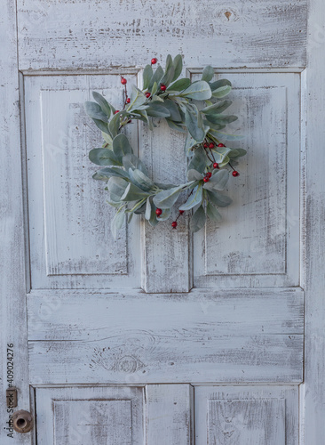 Lamb's Ear with red berries wreath on white antique door