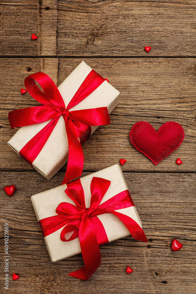 Valentine greeting card background with gift boxes, red ribbons and assorted hearts Valentine greeting card background with gift boxes, red ribbons and assorted hearts