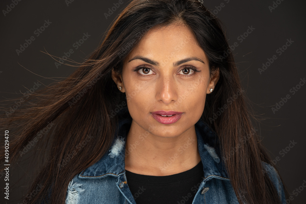 Beautiful Asian Indian woman in jean jacket. Beautiful Asian Indian woman in jean jacket.