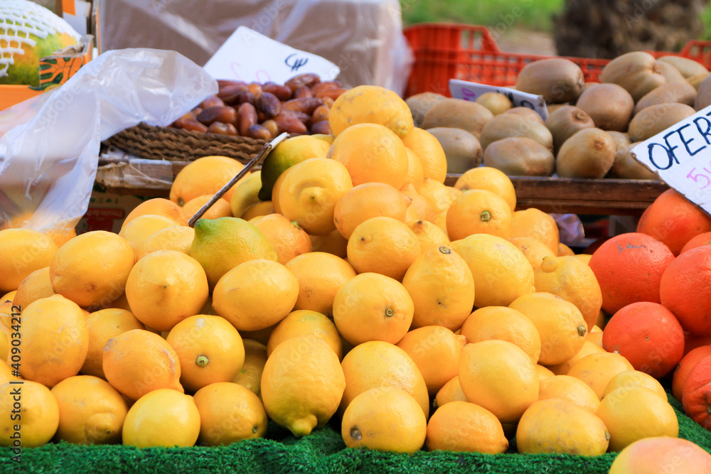 Lemons for sale at a market stall