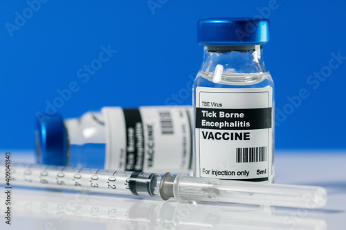 tick borne encephalitis TBE virus vaccine vials and syringe photo