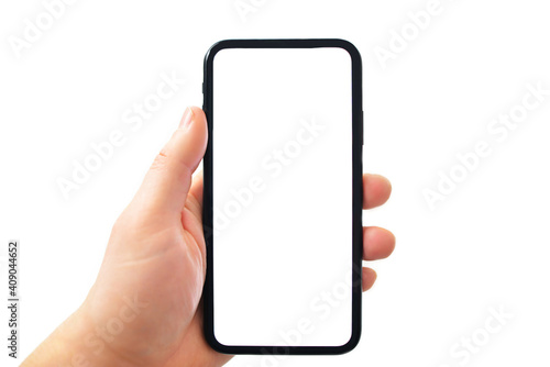 Man holding smartphone with blank screen on white background, closeup of hand. Space for text.