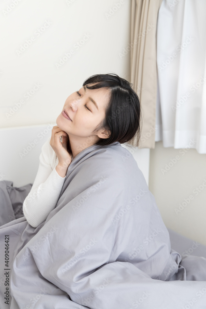 Woman waking up in bed Woman waking up in bed