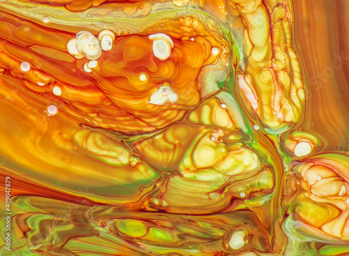 Abstract image of various colors of acrylic paint mixed together using a paint pouring  technique photo