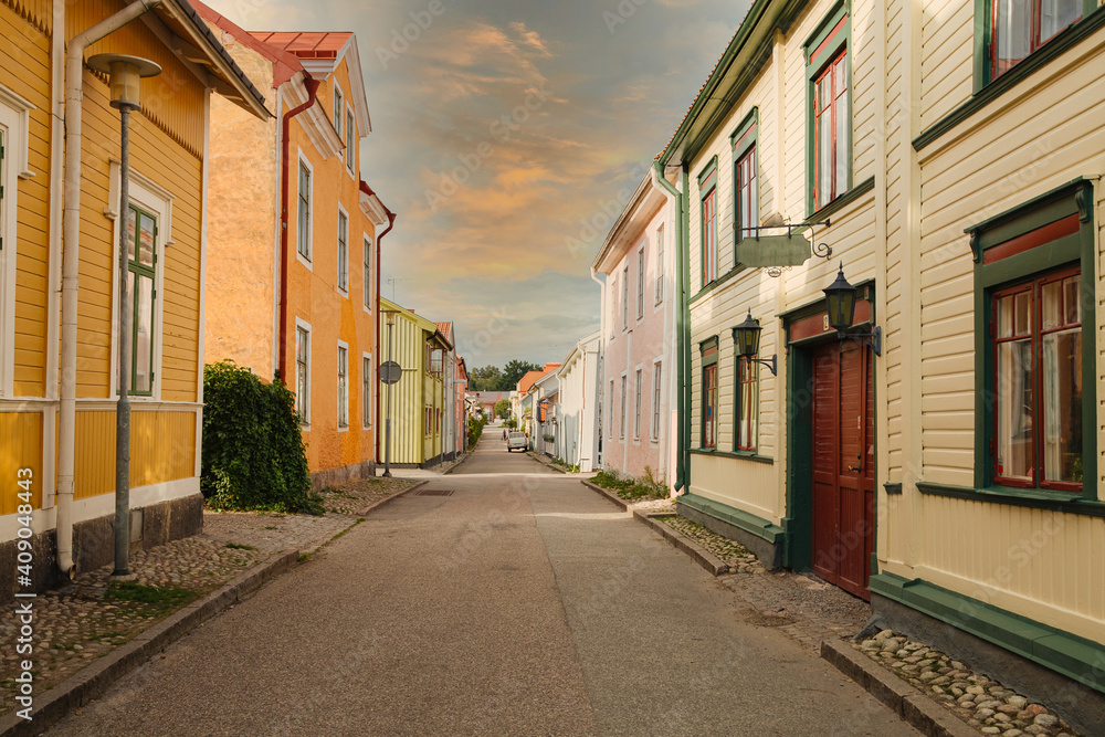 street in the old town. Street in a small town in Sweden. Colorful houses on a street in Sweden. Swedish architecture. Colorful wooden houses 